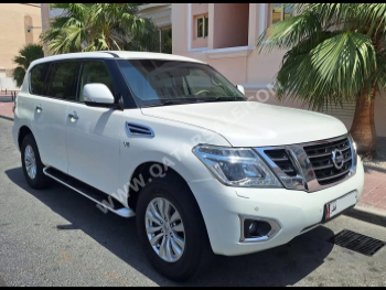 Nissan  Patrol  SE  2015  Automatic  234,000 Km  8 Cylinder  Four Wheel Drive (4WD)  SUV  White