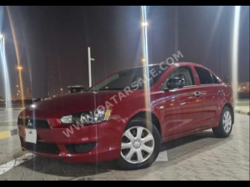 Mitsubishi  Lancer  EX  2015  Automatic  160,000 Km  4 Cylinder  Front Wheel Drive (FWD)  Sedan  Maroon