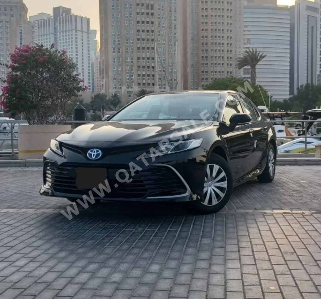 Toyota  Camry  Hybrid  2024  Automatic  0 Km  4 Cylinder  Front Wheel Drive (FWD)  Sedan  Black  With Warranty
