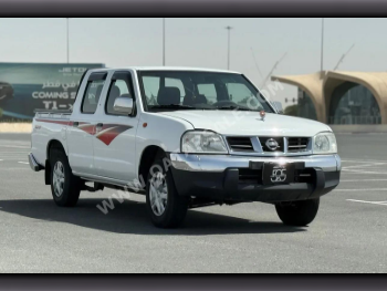 Nissan  Pickup  2013  Manual  279,000 Km  4 Cylinder  Rear Wheel Drive (RWD)  Pick Up  White