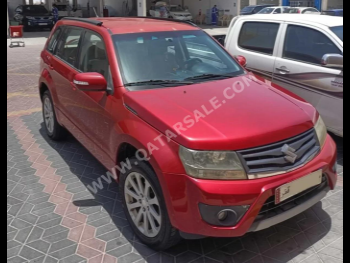 Suzuki  Grand Vitara  2014  Automatic  213,000 Km  4 Cylinder  Four Wheel Drive (4WD)  SUV  Maroon