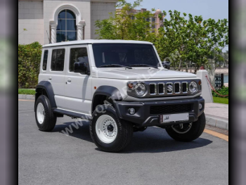 Suzuki  Jimny  2024  Automatic  13,000 Km  4 Cylinder  Four Wheel Drive (4WD)  SUV  White  With Warranty