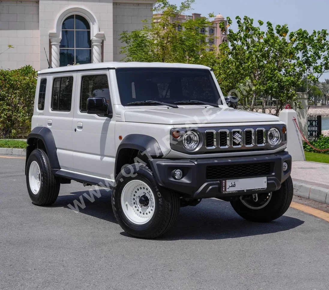 Suzuki  Jimny  2024  Automatic  13,000 Km  4 Cylinder  Four Wheel Drive (4WD)  SUV  White  With Warranty