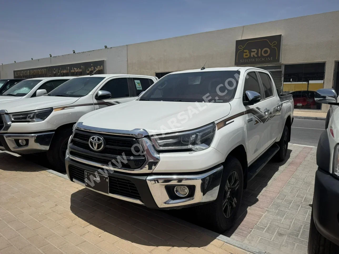 Toyota  Hilux  SR5  2024  Automatic  25,000 Km  4 Cylinder  Four Wheel Drive (4WD)  Pick Up  White  With Warranty