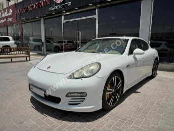 بورش  بانميرا  اس  2010  اوتوماتيك  150,000 كم  8 سلندر  دفع خلفي  سيدان  أبيض