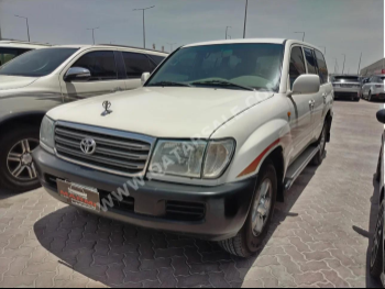 Toyota  Land Cruiser  GX  2004  Manual  341,000 Km  6 Cylinder  Four Wheel Drive (4WD)  SUV  White