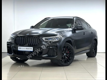 بي ام دبليو  الفئة - اكس  اكس 6 50i ام  2023  اوتوماتيك  2,450 كم  8 سلندر  دفع رباعي  اس يو في  اسود مطفي  تحت الضمان