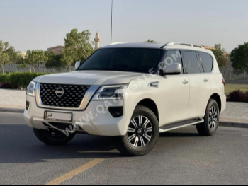 Nissan  Patrol  SE  2023  Automatic  83,000 Km  6 Cylinder  Four Wheel Drive (4WD)  SUV  White  With Warranty
