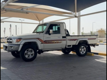 Toyota  Land Cruiser  LX  2023  Manual  88,000 Km  6 Cylinder  Four Wheel Drive (4WD)  Pick Up  White  With Warranty