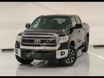Toyota  Tundra  TRD  2015  Automatic  199,000 Km  8 Cylinder  Four Wheel Drive (4WD)  Pick Up  Black