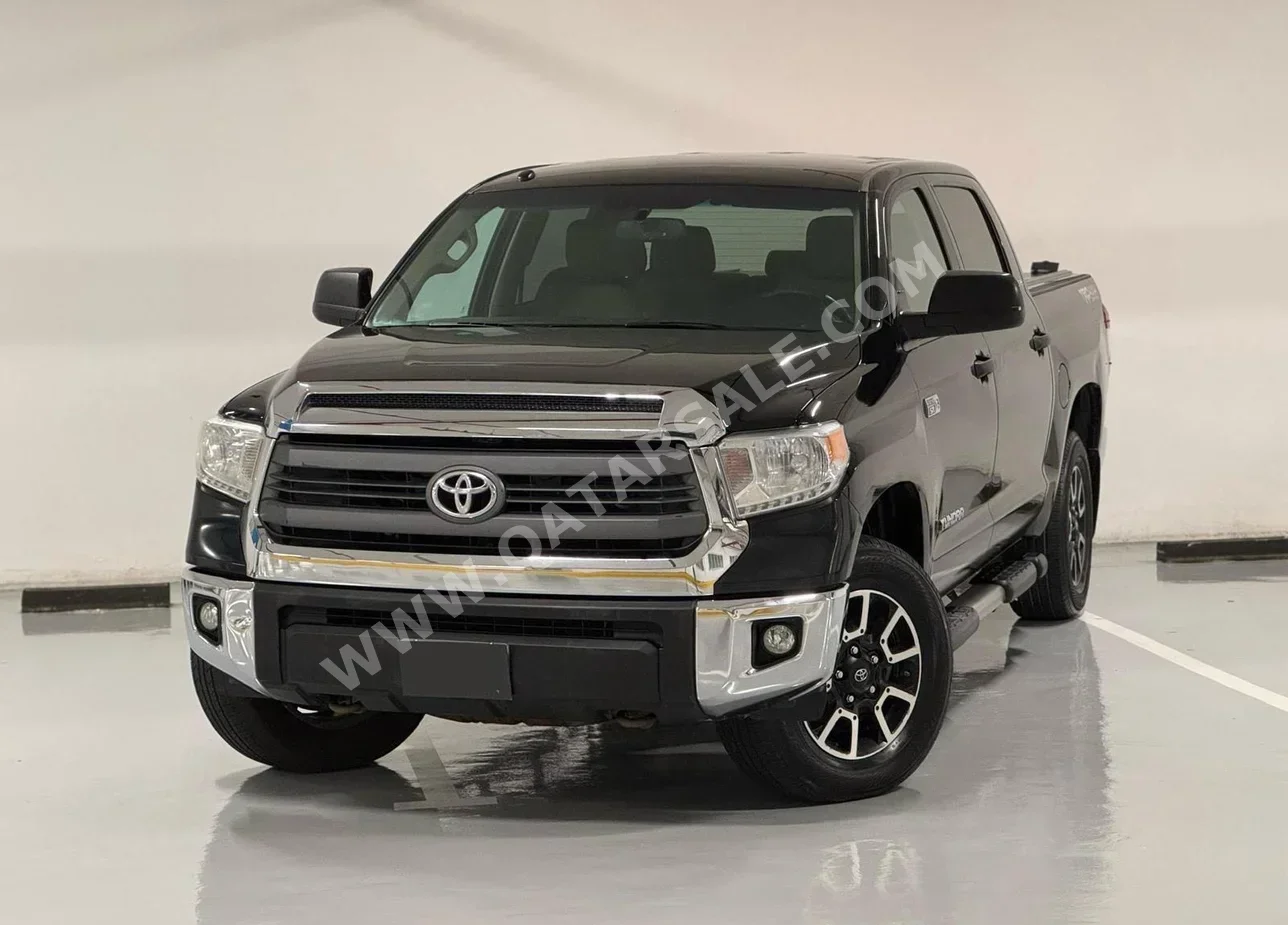 Toyota  Tundra  TRD  2015  Automatic  199,000 Km  8 Cylinder  Four Wheel Drive (4WD)  Pick Up  Black