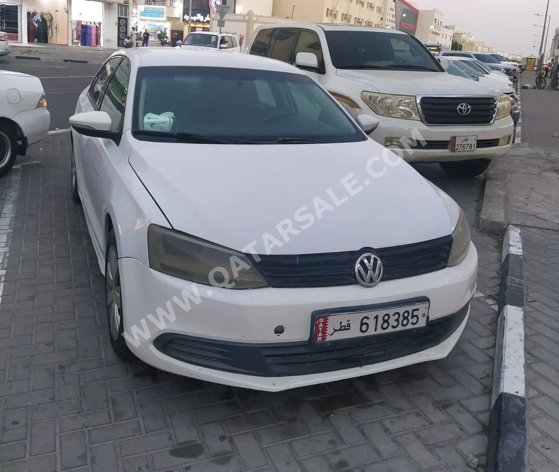 Volkswagen  Jetta  2014  Automatic  246,000 Km  4 Cylinder  Sedan  White