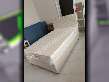 الأسّرة