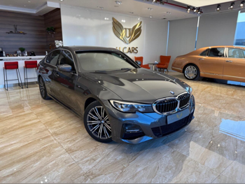 BMW  3-Series  320i  2021  Automatic  34,000 Km  4 Cylinder  Front Wheel Drive (FWD)  Sedan  Gray