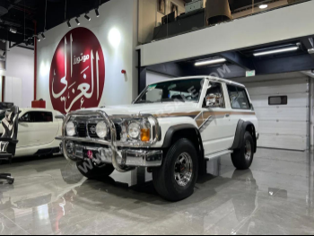 Nissan  Patrol  Safari  1993  Manual  117,000 Km  6 Cylinder  Four Wheel Drive (4WD)  SUV  White