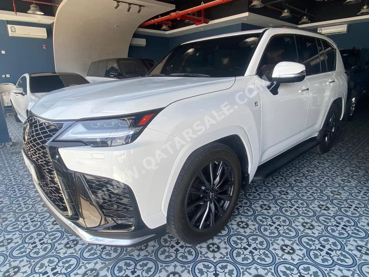 Lexus  LX  600 F Sport  2022  Automatic  91,000 Km  8 Cylinder  Four Wheel Drive (4WD)  SUV  White  With Warranty