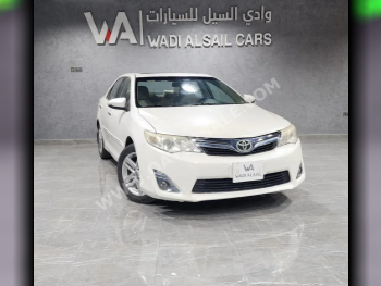 Toyota  Camry  GLX  2014  Automatic  79,000 Km  4 Cylinder  Front Wheel Drive (FWD)  Sedan  White