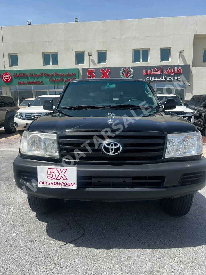 Toyota  Land Cruiser  G  2006  Manual  290,000 Km  6 Cylinder  Four Wheel Drive (4WD)  SUV  Black