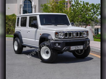 Suzuki  Jimny  2024  Automatic  12,000 Km  4 Cylinder  Four Wheel Drive (4WD)  SUV  White  With Warranty