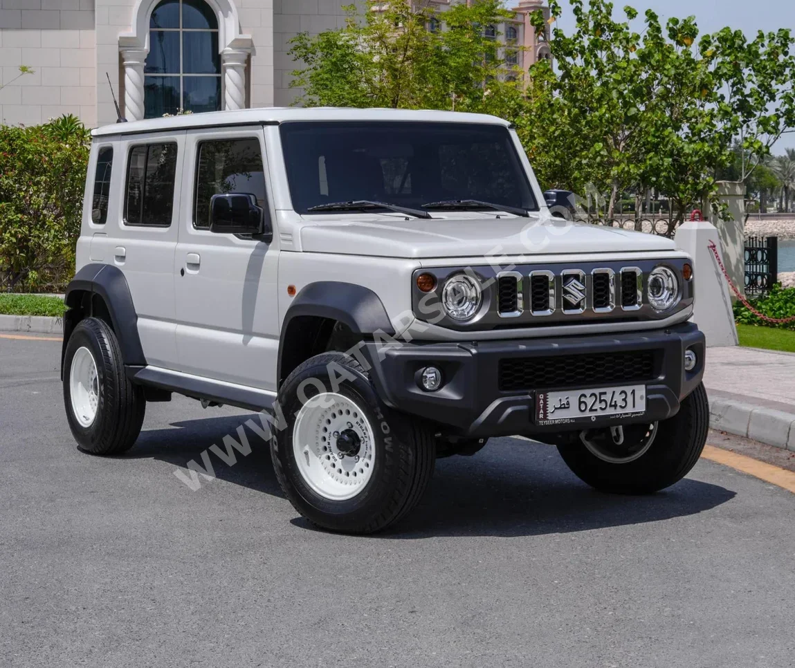Suzuki  Jimny  2024  Automatic  12,000 Km  4 Cylinder  Four Wheel Drive (4WD)  SUV  White  With Warranty