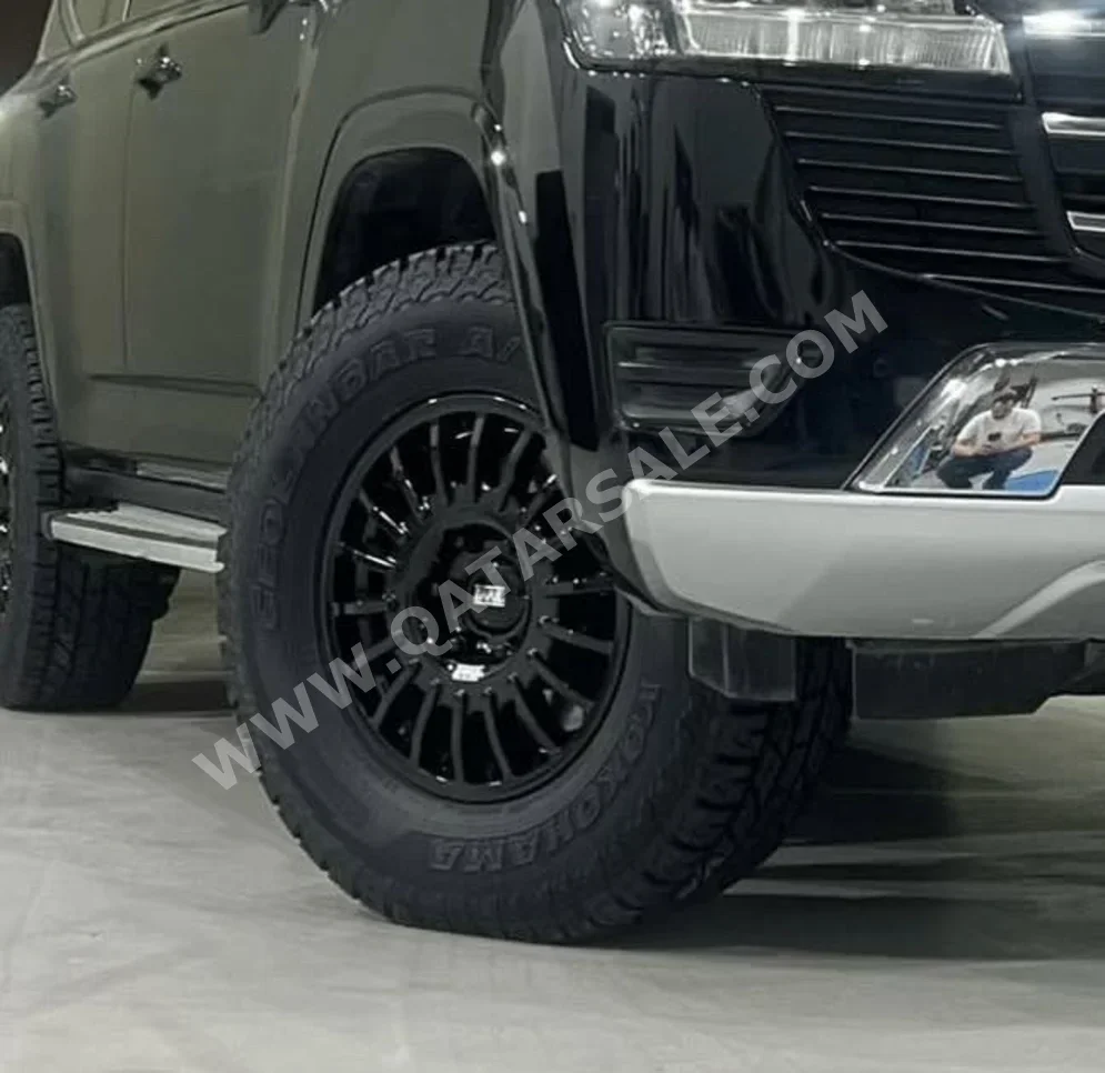 Tire & Rims Yokohama Made in Qatar /  4 Seasons  Rim Included  17 mm  17"