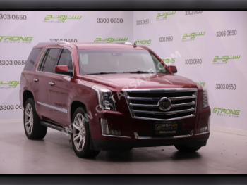 Cadillac  Escalade  2015  Automatic  291,000 Km  8 Cylinder  Four Wheel Drive (4WD)  SUV  Maroon