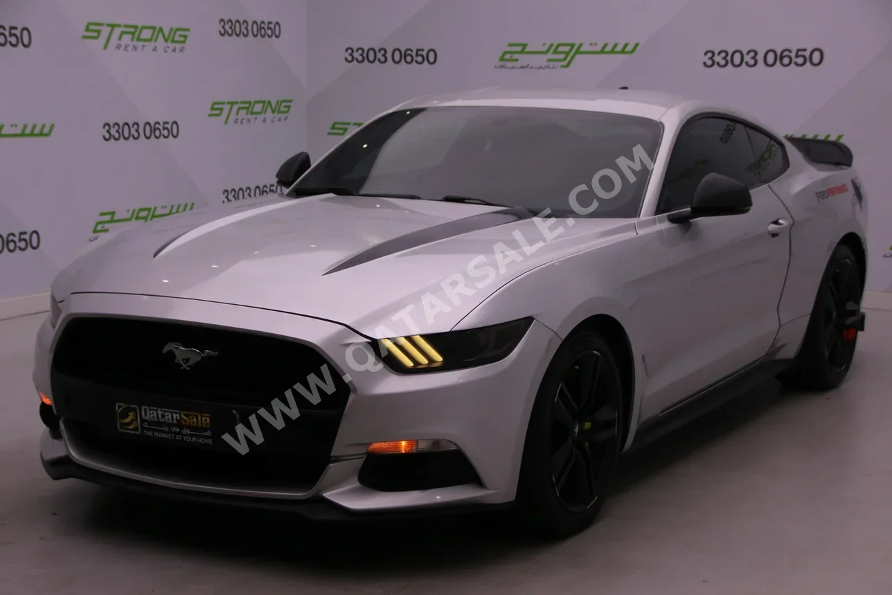 Ford  Mustang  Ecoboost  2015  Automatic  153,000 Km  4 Cylinder  Rear Wheel Drive (RWD)  Coupe / Sport  Silver