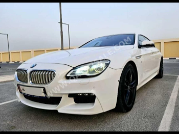 BMW  6-Series  650i  2016  Automatic  140,000 Km  8 Cylinder  Rear Wheel Drive (RWD)  Sedan  White