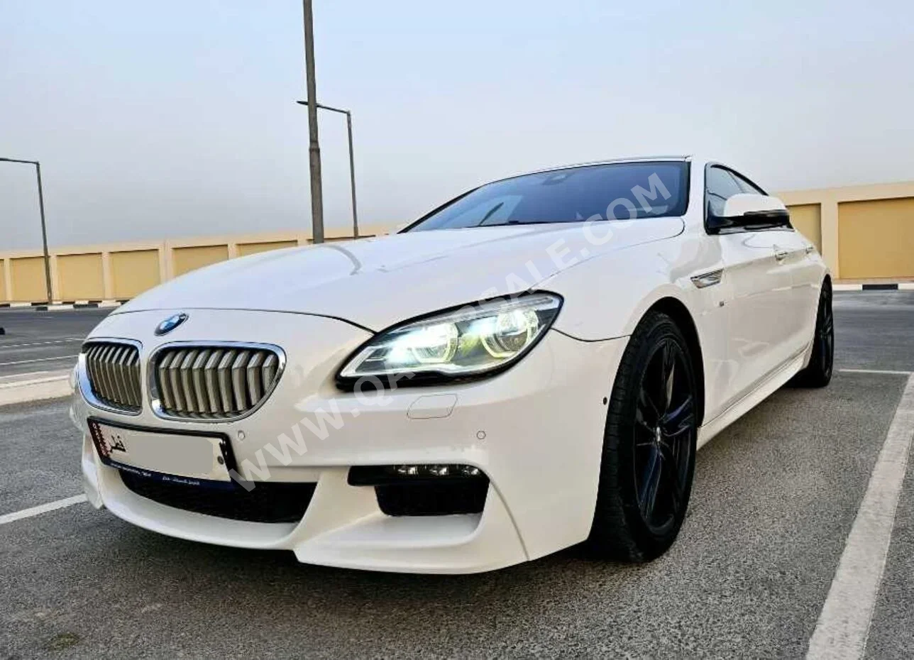 BMW  6-Series  650i  2016  Automatic  140,000 Km  8 Cylinder  Rear Wheel Drive (RWD)  Sedan  White
