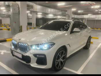 BMW  X-Series  X6 M40i  2021  Automatic  97,000 Km  6 Cylinder  Four Wheel Drive (4WD)  SUV  White  With Warranty