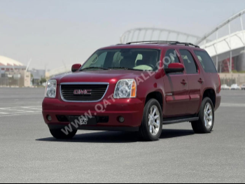GMC  Yukon  2009  Automatic  210,000 Km  8 Cylinder  Four Wheel Drive (4WD)  SUV  Red