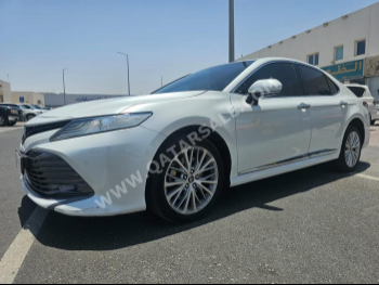 Toyota  Camry  Limited  2019  Automatic  167,000 Km  6 Cylinder  Front Wheel Drive (FWD)  Sedan  White