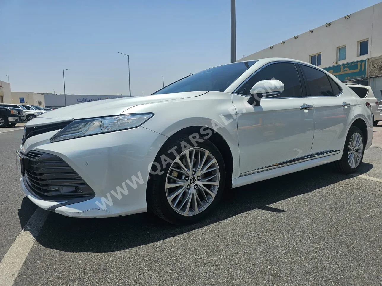 Toyota  Camry  Limited  2019  Automatic  167,000 Km  6 Cylinder  Front Wheel Drive (FWD)  Sedan  White