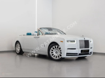 رولز - رويس  فانتوم  دروب هيد  2008  اوتوماتيك  131,000 كم  12 سلندر  دفع كلي مستمر  كشف  أبيض