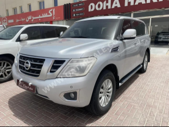 Nissan  Patrol  XE  2014  Automatic  372,000 Km  6 Cylinder  Four Wheel Drive (4WD)  SUV  Silver