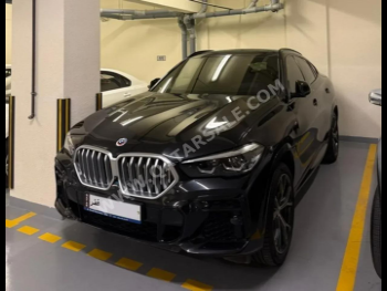 BMW  X-Series  X6 40i  2023  Automatic  45,000 Km  6 Cylinder  Four Wheel Drive (4WD)  SUV  Black  With Warranty