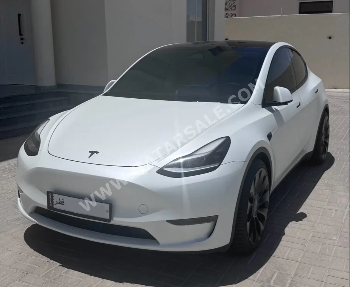 Tesla  Model Y  Performance  2024  Automatic  24,000 Km  0 Cylinder  All Wheel Drive (AWD)  SUV  White  With Warranty