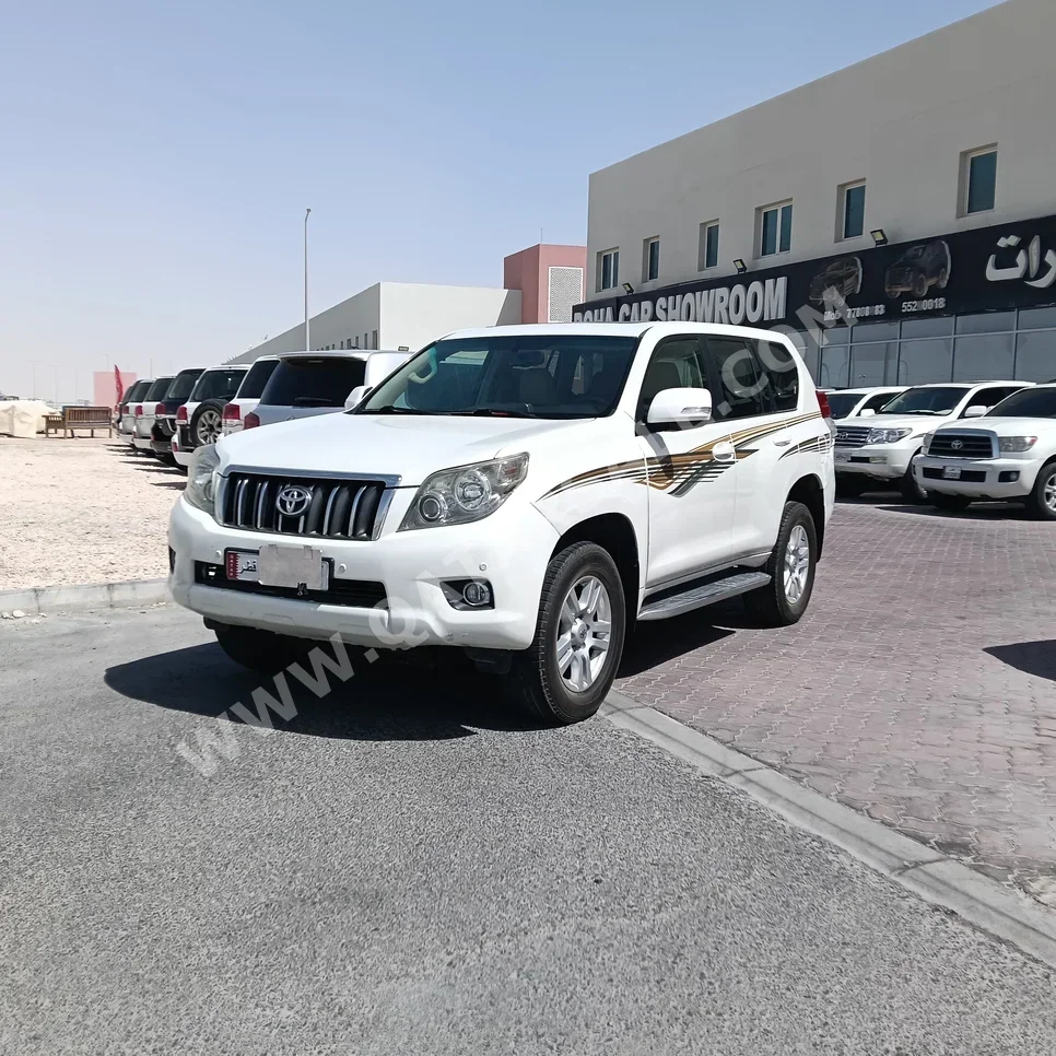 Toyota  Prado  TXL  2010  Automatic  304,000 Km  6 Cylinder  Four Wheel Drive (4WD)  SUV  White