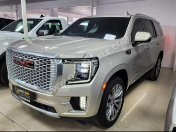 GMC  Yukon  Denali  2023  Automatic  16,000 Km  8 Cylinder  Four Wheel Drive (4WD)  SUV  Gold  With Warranty
