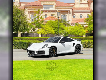 بورش  911  توربو اس  2021  اوتوماتيك  16,800 كم  6 سلندر  دفع خلفي  كوبيه \ سبورت  أبيض  تحت الضمان
