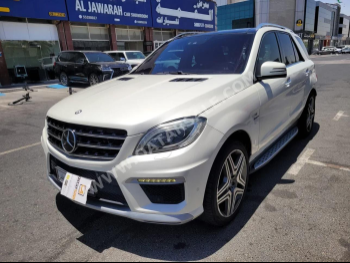 Mercedes-Benz  ML  63 AMG  2013  Automatic  190,000 Km  8 Cylinder  Four Wheel Drive (4WD)  SUV  White