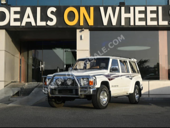 Nissan  Patrol  Super Safari  1997  Manual  7,246 Km  6 Cylinder  Four Wheel Drive (4WD)  SUV  White