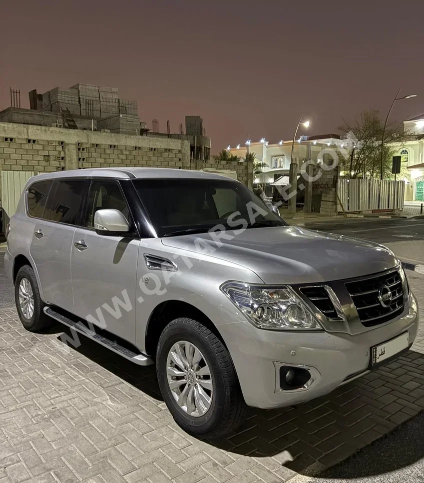  Nissan  Patrol  SE  2014  Automatic  98,000 Km  8 Cylinder  Four Wheel Drive (4WD)  SUV  Silver  With Warranty