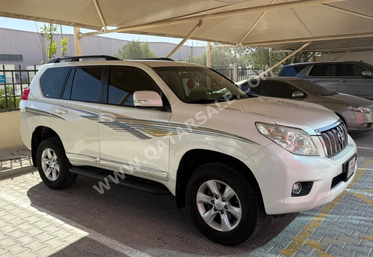 Toyota  Prado  TXL  2013  Automatic  290,000 Km  4 Cylinder  Four Wheel Drive (4WD)  SUV  White
