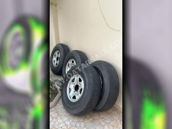 العجلات والجنوط (الرنقات) صنع في اليابان \  4 مواسم  تشمل الرنق  2 ميليمتر  16"