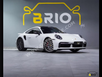 بورش  911  توربو  2022  اوتوماتيك  27,000 كم  8 سلندر  دفع خلفي  كوبيه \ سبورت  أبيض