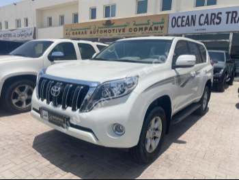 Toyota  Prado  TXL  2014  Automatic  445,000 Km  6 Cylinder  Four Wheel Drive (4WD)  SUV  White