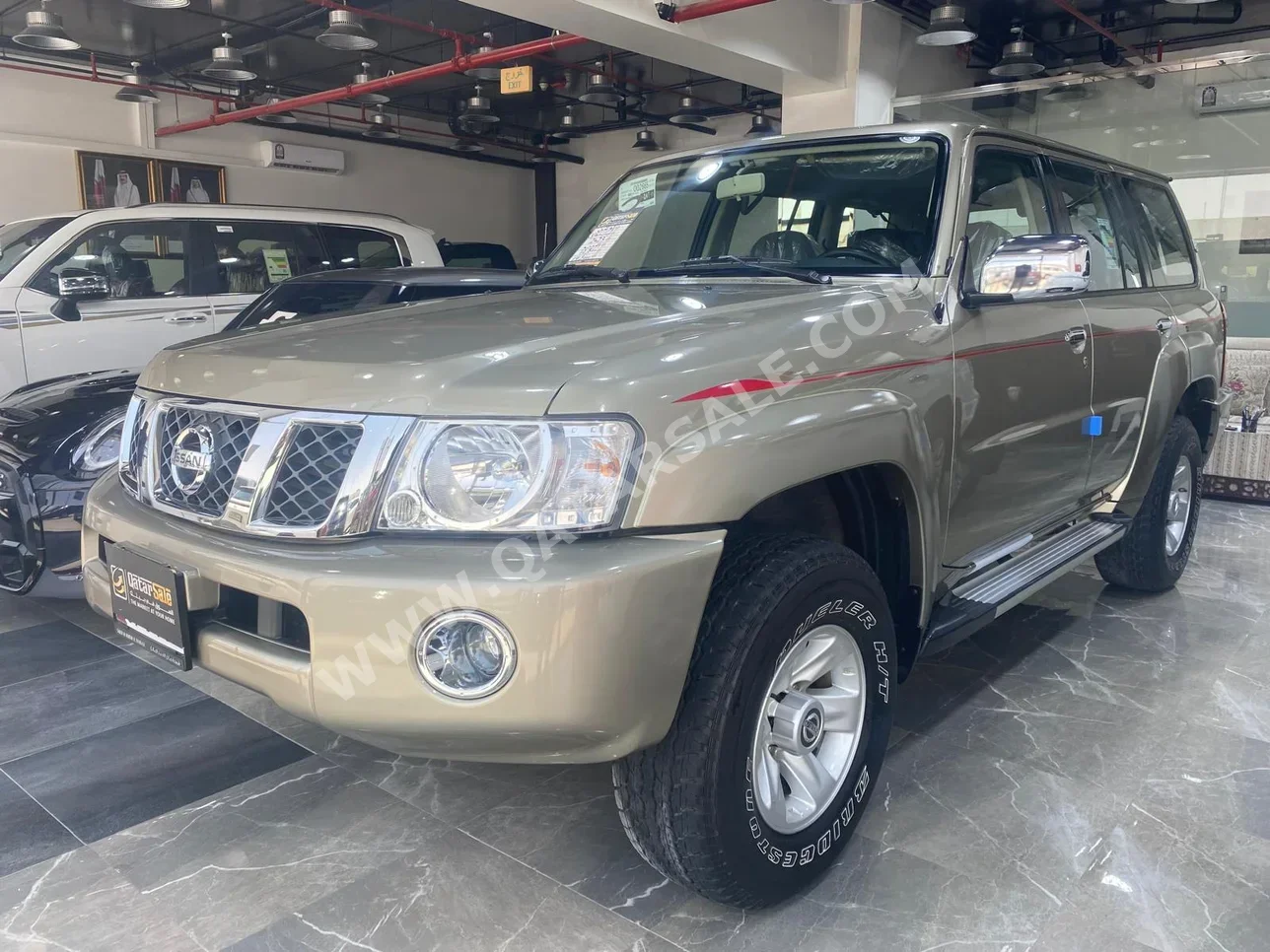 Nissan  Patrol  Safari  2023  Automatic  12,800 Km  6 Cylinder  Four Wheel Drive (4WD)  SUV  Gold