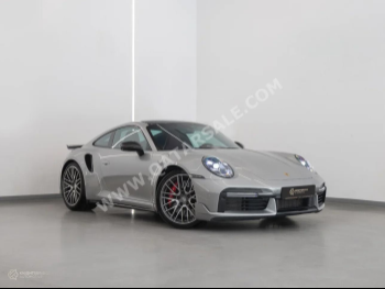 Porsche  911  Turbo  2021  Automatic  23,400 Km  6 Cylinder  Rear Wheel Drive (RWD)  Coupe / Sport  Silver  With Warranty