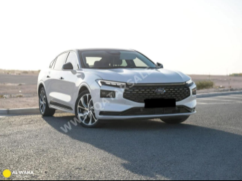 Ford  Taurus  Titanum  2023  Automatic  39,000 Km  4 Cylinder  Front Wheel Drive (FWD)  Sedan  White  With Warranty